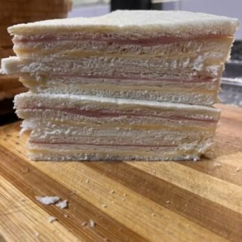 Sándwich triple de jamón y queso (12 unid)